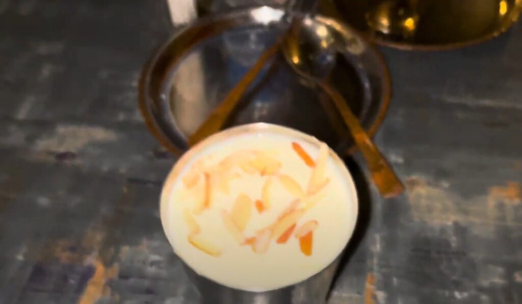 Image of Odia Nana enjoying lassi