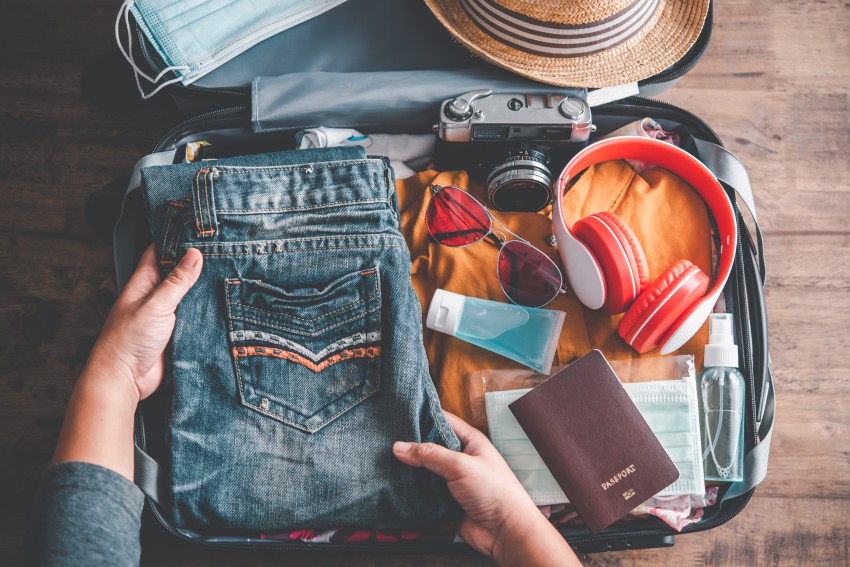 image of a person doing packing for long drive trip
