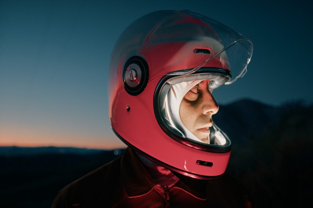 Image of a biker wearing helmet for safety